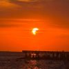 Eclissi parziale di sole, lo spettacolo al tramonto nei cieli d’Italia